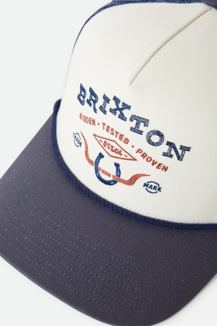 Unisex Beekman Netplus Trucker Hat in the color Off White/Navy - Additional Laydown image
