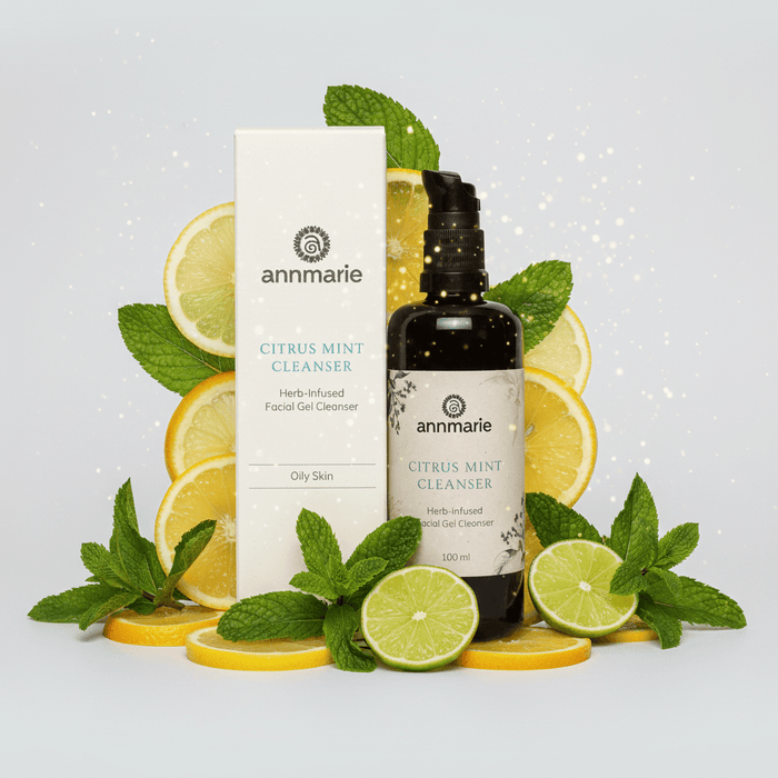 Annmarie Citrus Mint Cleanser bottle and packaging with citrus fruits and mint leaves on a light gray background
