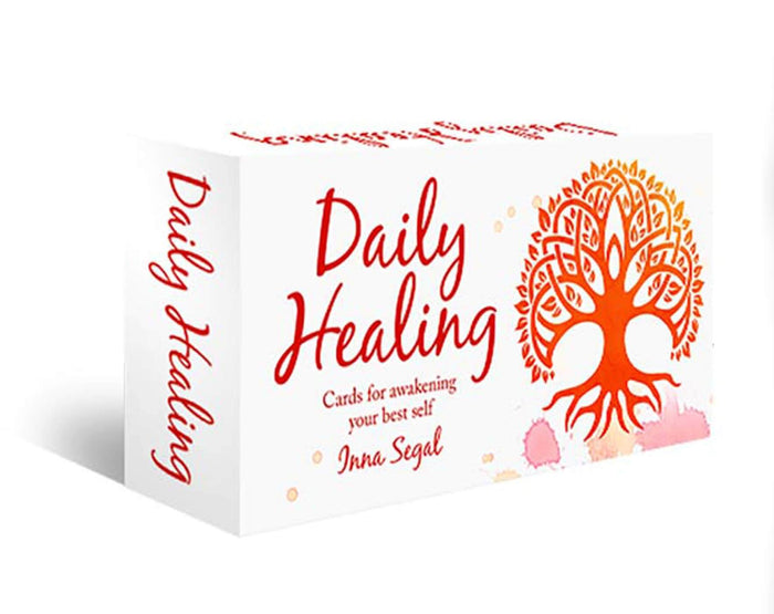 Box of 'Daily Healing' cards with a tree design on a white background
