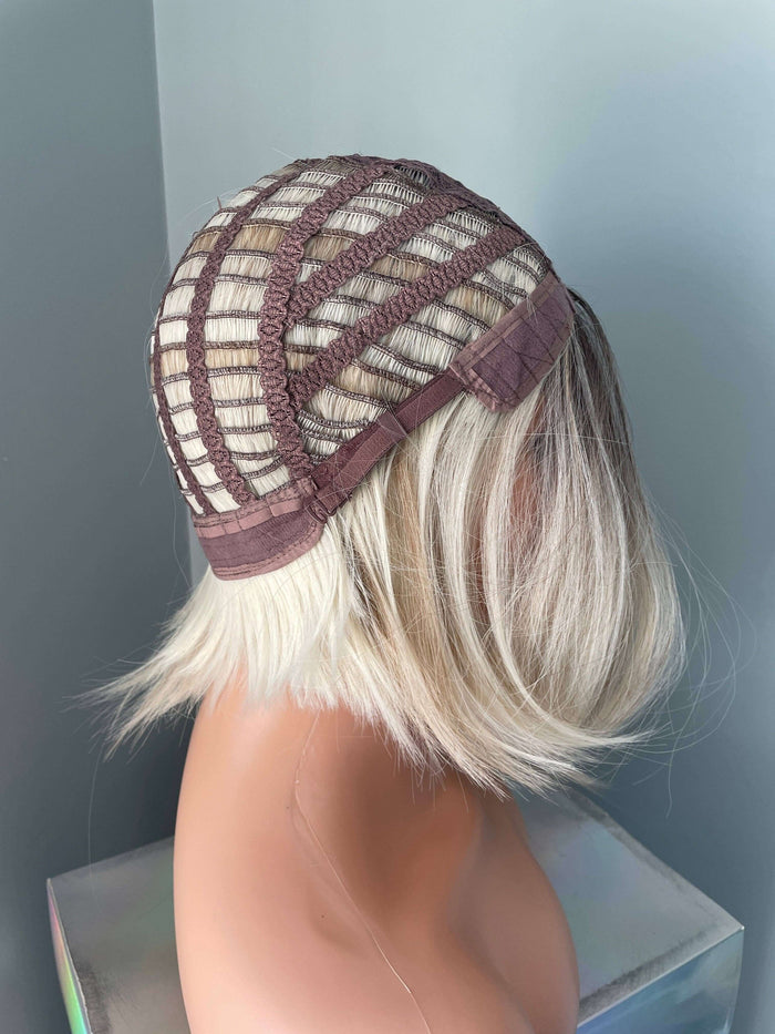 Cap construction of the Katya Short Blonde Rooted Synthetic Bob Wig, showcasing its interior detailing.