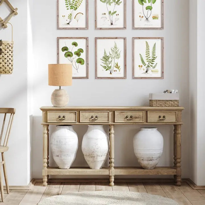 The NAPA HOME AND GARDEN - MADDIE TABLE LAMP features a round, ribbed ceramic base in light beige and a textured brown natural linen shade, adding simple modern style to any room.