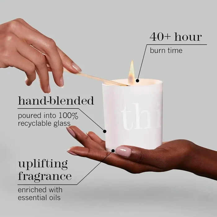 This Works Lavender & Roman Chamomile Scented Candle with hand-blended quality, 40+ hour burn time, and uplifting fragrance.
