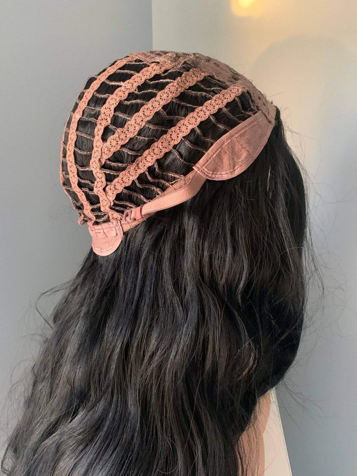 Close-up of the inner cap construction of the Valentina Long Black Soft Waves Wig, showcasing breathable design features.