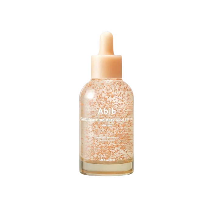 ABIB Glutathiosome Dark Spot Serum Vita Drop is a brightening serum designed to reduce dark spots and even out skin tone. Formulated with Niacinamide, Glutathione, and Vitamin C derivatives, it helps diminish pigmentation while enhancing skin radiance. Enriched with Centella Asiatica and Madecassoside, it soothes and repairs the skin, while Ceramides and Beta-Glucan provide hydration and strengthen the skin barrier. This lightweight serum absorbs quickly, leaving the skin smoother, clearer, and