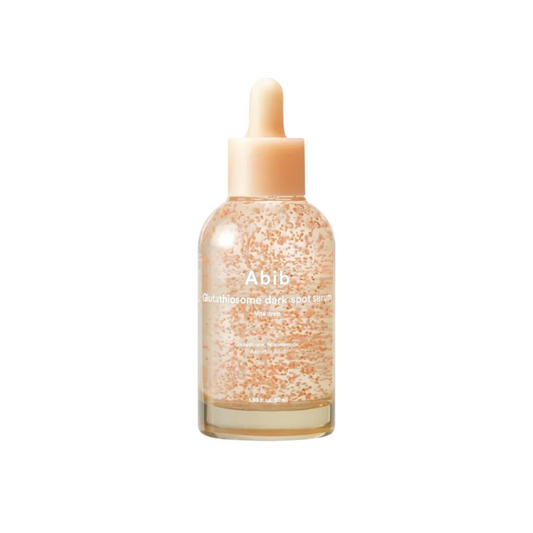 ABIB Glutathiosome Dark Spot Serum Vita Drop is a brightening serum designed to reduce dark spots and even out skin tone. Formulated with Niacinamide, Glutathione, and Vitamin C derivatives, it helps diminish pigmentation while enhancing skin radiance. Enriched with Centella Asiatica and Madecassoside, it soothes and repairs the skin, while Ceramides and Beta-Glucan provide hydration and strengthen the skin barrier. This lightweight serum absorbs quickly, leaving the skin smoother, clearer, and