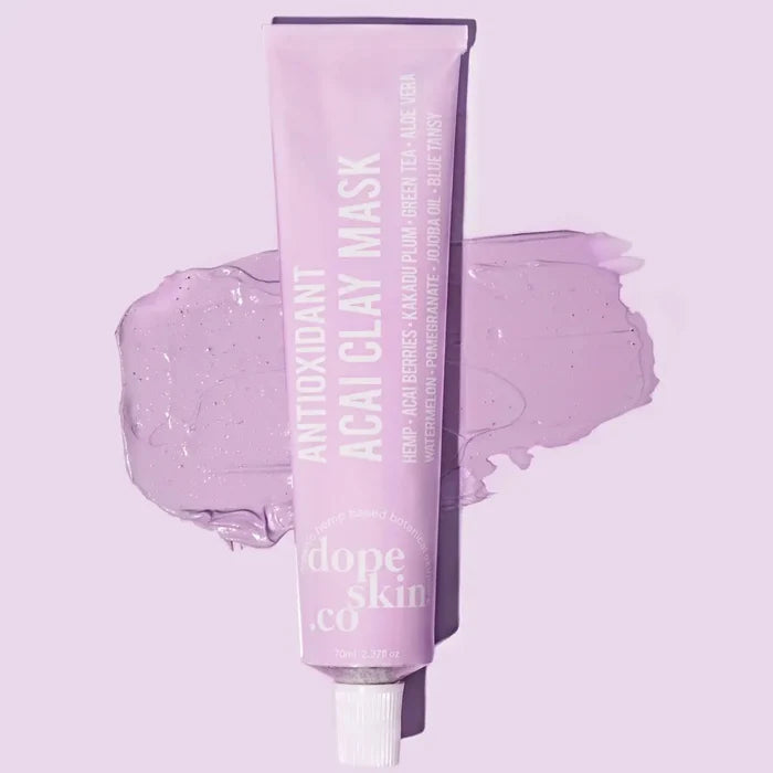 Purple clay mask tube with 'dope skin co' branding on a matching purple background