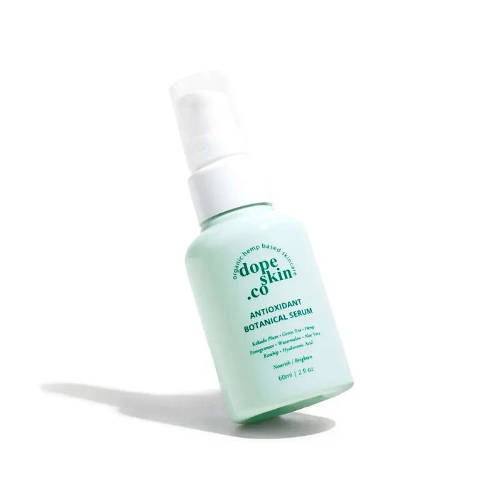 Skincare serum bottle with 'dope skin co.' branding on a white background