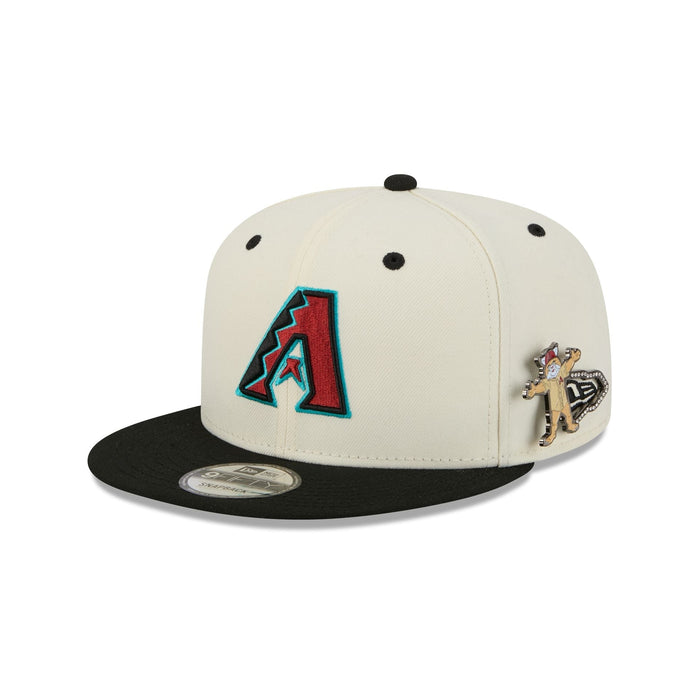 https://cdn.shopify.com/s/files/1/0601/2554/4675/files/60758455_9FIFTY_MASCOTPIN26993_ARIDIA_CHW_3QL.jpg?v=1763476290