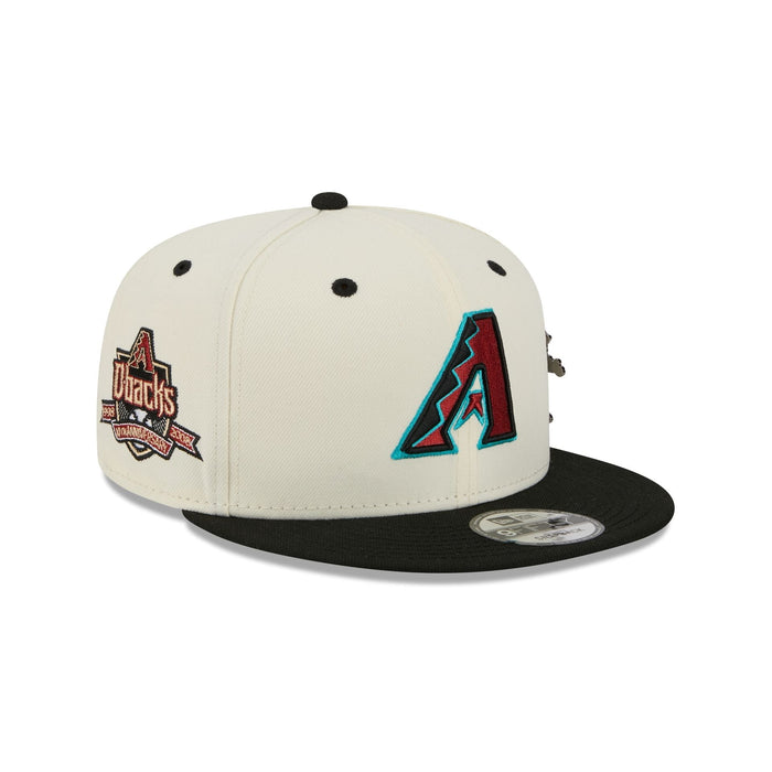 https://cdn.shopify.com/s/files/1/0601/2554/4675/files/60758455_9FIFTY_MASCOTPIN26993_ARIDIA_CHW_3QR.jpg?v=1763476290
