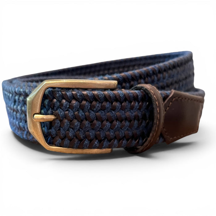 A person wearing a black shirt and grey pants with the ATHISON Braided Leather and Wool Stretch Belt in dark brown and blue.