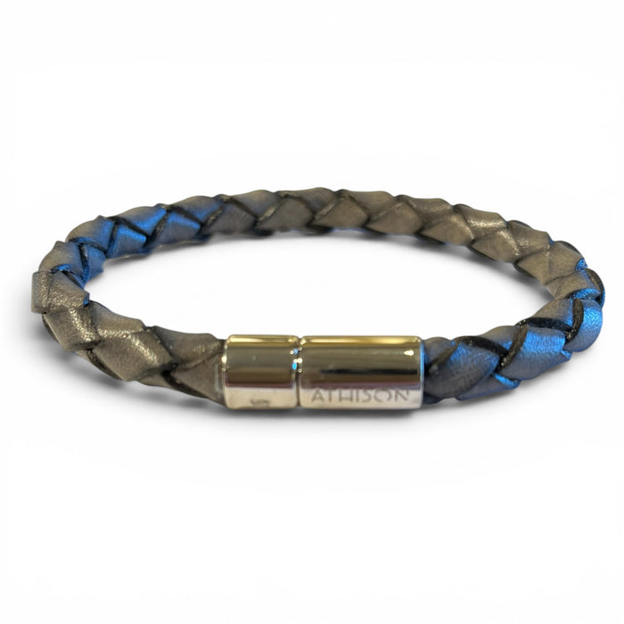 The ATHISON - BRAIDED LEATHER BRACELET IN GREY by ATHISON features Italian craftsmanship in blue and grey braided leather with a shiny silver "ATHISON" engraved clasp, presented on a white background.