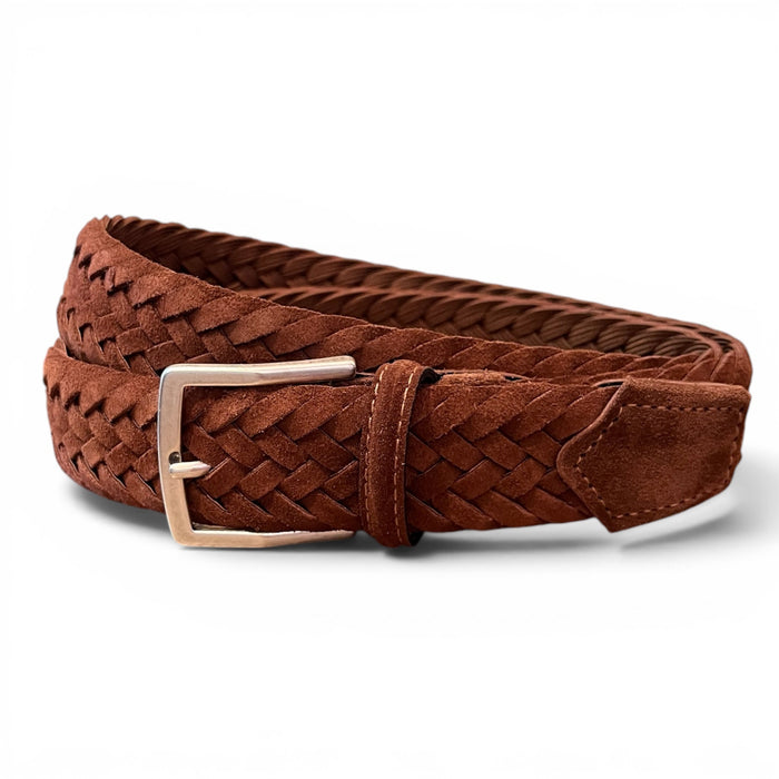 The ATHISON - BRAIDED SUEDE BELT IN BROWN is a premium men’s belt by ATHISON, featuring a brown braided suede design with a silver rectangular buckle, neatly coiled on a white background.