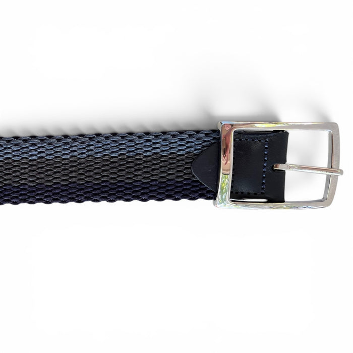 The ATHISON Reversible Stretch Belt features indigo, manatee, and light blue stripes on one side, solid indigo on the other, an Italian leather-trimmed end, and a shiny silver buckle, displayed against a white background.