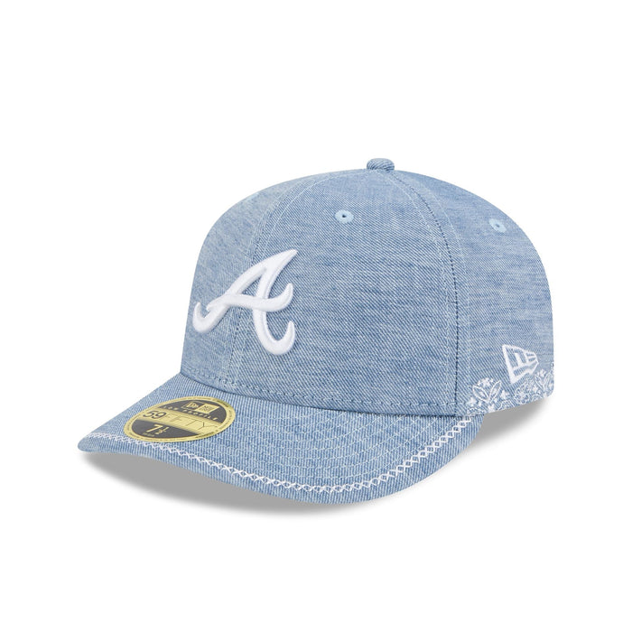 https://cdn.shopify.com/s/files/1/0601/2554/4675/files/60668415_LP59FIFTY_HANDSTITCHEDCHAMBR_ATLBRA_OTC_3QL.jpg?v=1739218476