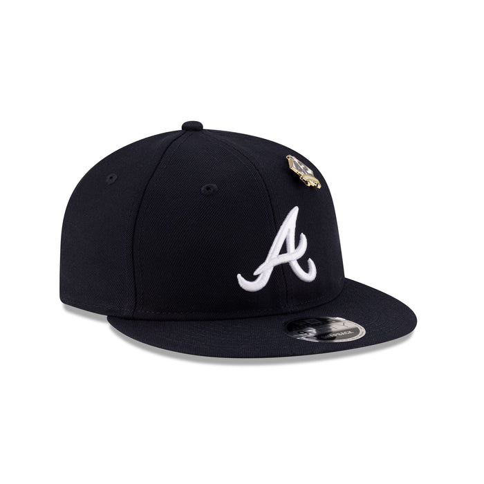 https://cdn.shopify.com/s/files/1/0601/2554/4675/files/60662281_RC9FIFTY_JRD25_ATLBRA_NAV_3QR.jpg?v=1741724235