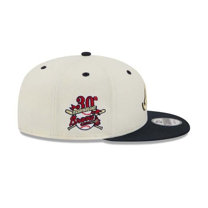 https://cdn.shopify.com/s/files/1/0601/2554/4675/files/60758448_9FIFTY_MASCOTPIN26993_ATLBRA_CHW_RSIDE.jpg?v=1763476278
