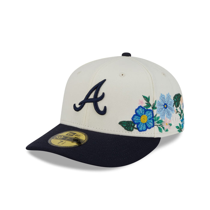 https://cdn.shopify.com/s/files/1/0601/2554/4675/files/60668975_59FIFTY_TONALFLORALS25426_ATLBRA_OTC_3QL.jpg?v=1746728139
