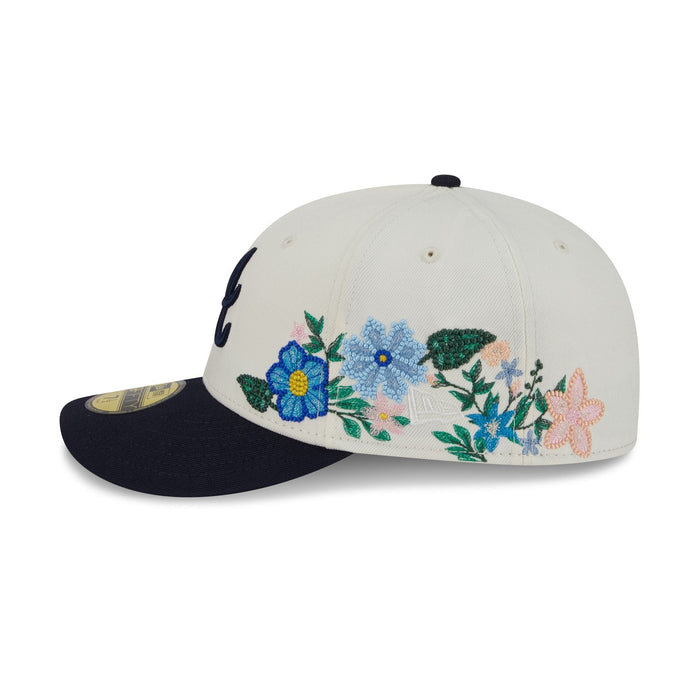 https://cdn.shopify.com/s/files/1/0601/2554/4675/files/60668975_59FIFTY_TONALFLORALS25426_ATLBRA_OTC_LSIDE.jpg?v=1746728139