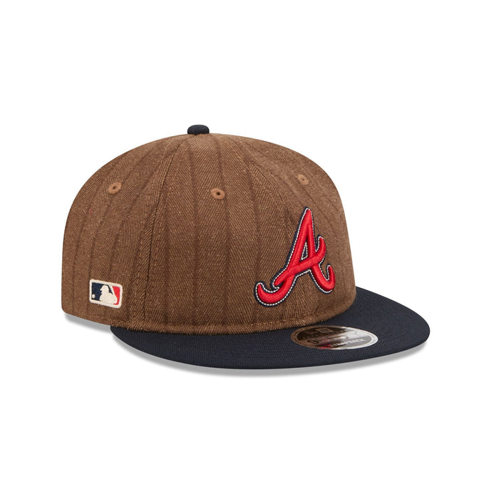 https://cdn.shopify.com/s/files/1/0601/2554/4675/files/60763747_RC9FIFTY_WOOLPINSTRIPE950RC_ATLBRA_OTC_3QR.jpg?v=1756992805