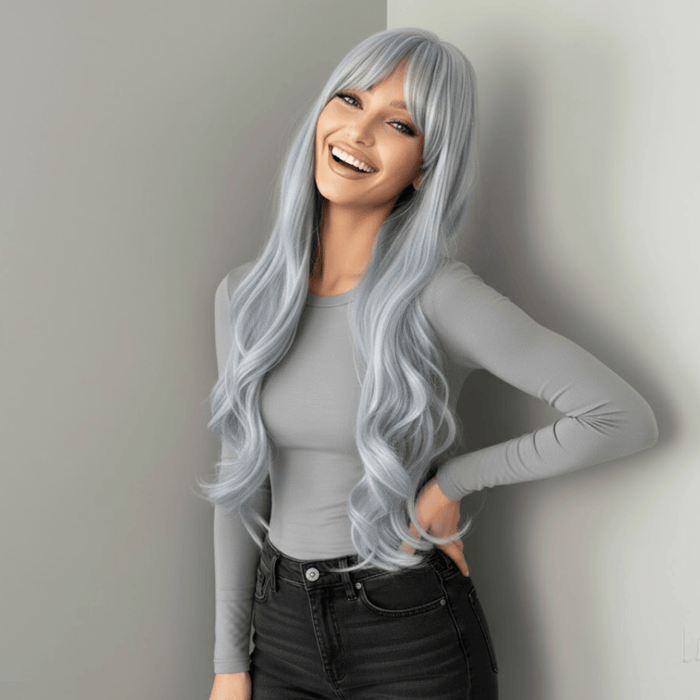Model wearing a long pastel blue wig, showcasing cascading waves and a stylish outfit, perfect for bold looks.