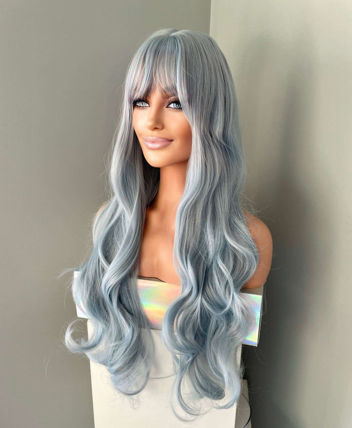 Azura Long Light Pastel Blue Wig showcasing long cascading waves in a soft powder blue shade