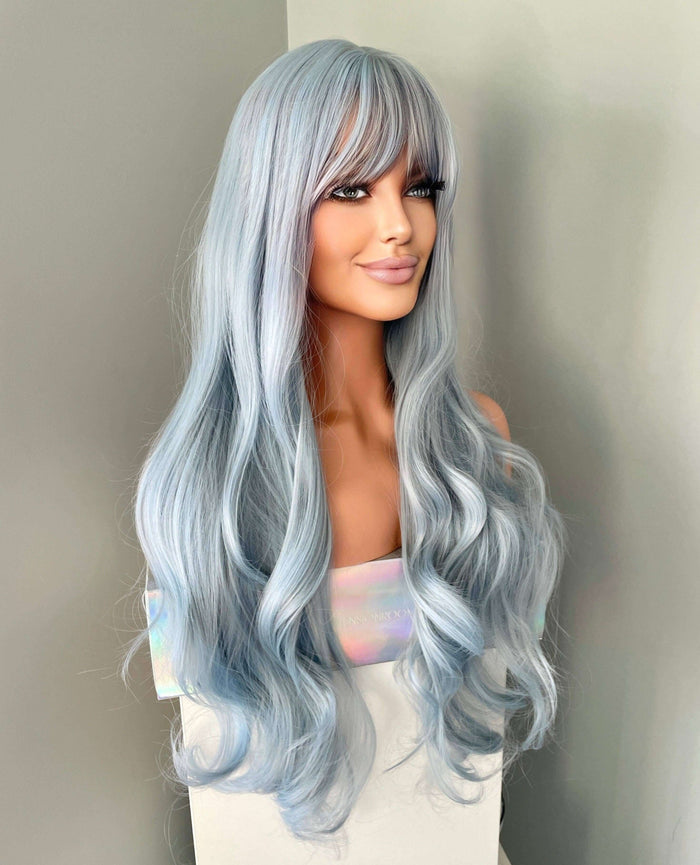 Azura Long Light Pastel Blue Wig on mannequin with cascading waves in soft powder blue shade, perfect for glam and cosplay.