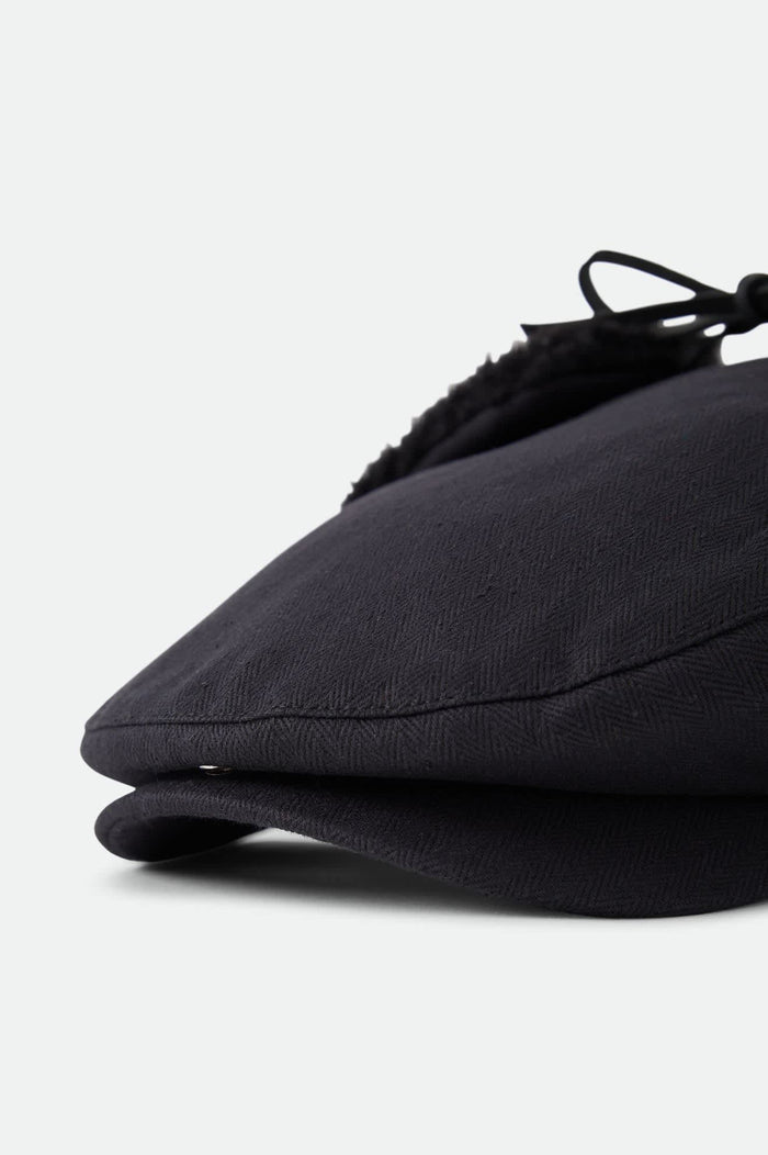 Unisex Barrel Earflap Snap Cap in the color Black/Black - Additional Laydown image