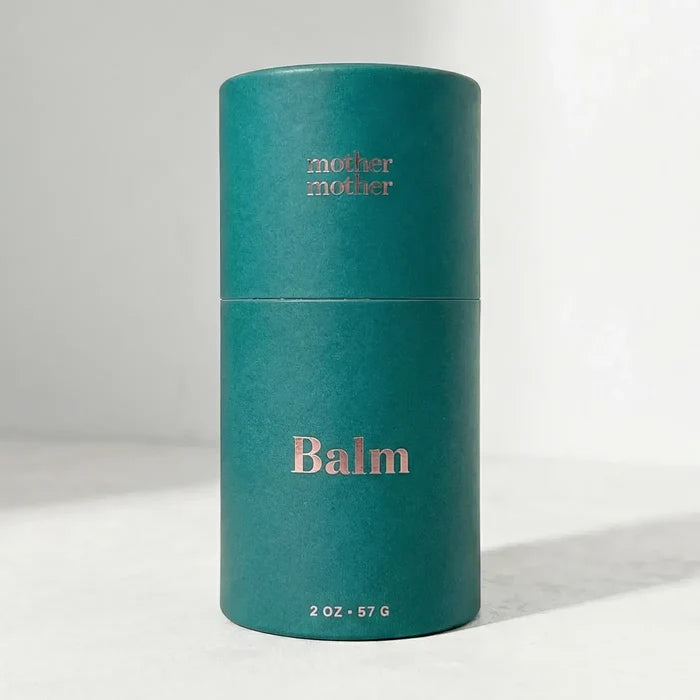 Teal cylindrical balm container with 'mother balm' branding on a white background
