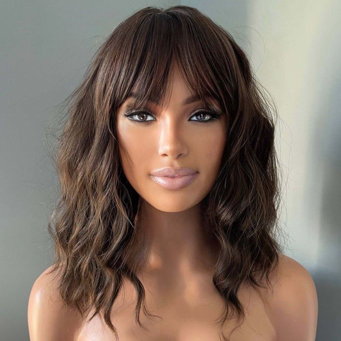 Bianca Short Dark Brown Wig with Bangs displaying soft body waves and full bangs framing the face, perfect for everyday wear.