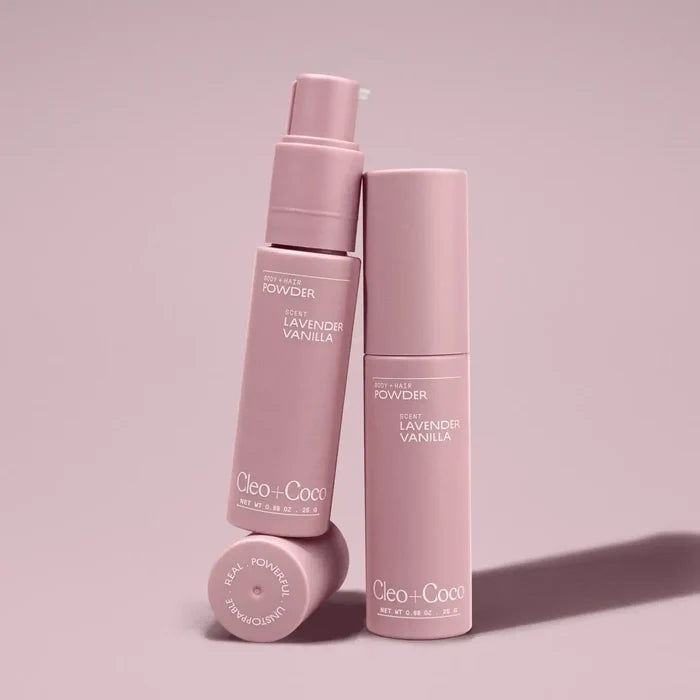 Pink skincare bottles with 'Cleo + Co.' branding on a pink background