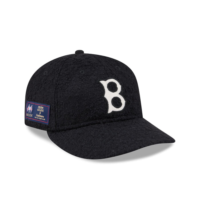 https://cdn.shopify.com/s/files/1/0601/2554/4675/files/60852039_RC9FIFTY_LifestyleEnergy_BOSRED_NAV_3QR.jpg?v=1768341460