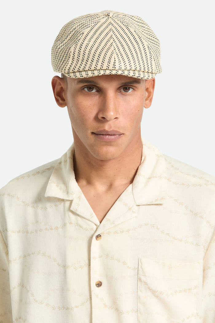 Unisex Brood Lightweight Newsboy Cap in the color Natural/Black Straw - Men's Front View