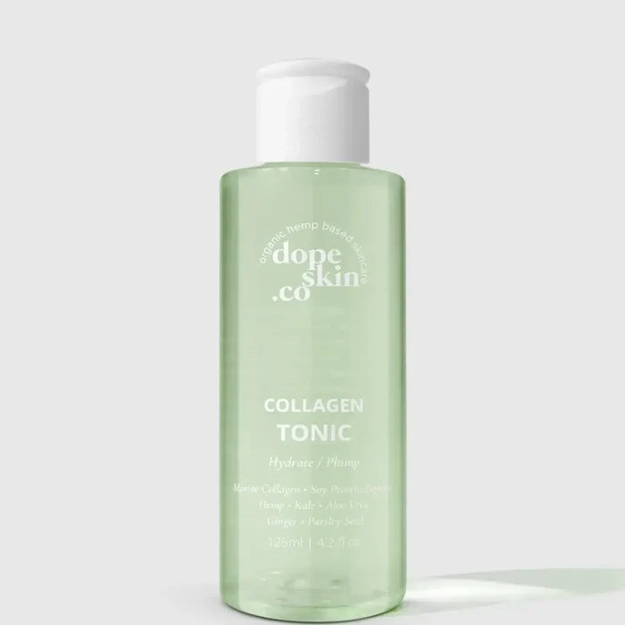 Bottle of dope skin co Collagen Tonic on a light gray background