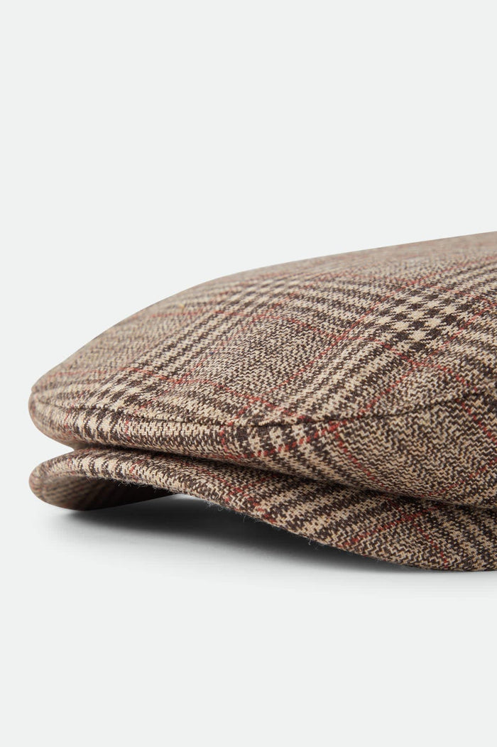 Unisex Century Barrel Snap Cap in the color Brown/Tan/Red Plaid - Additional Laydown image