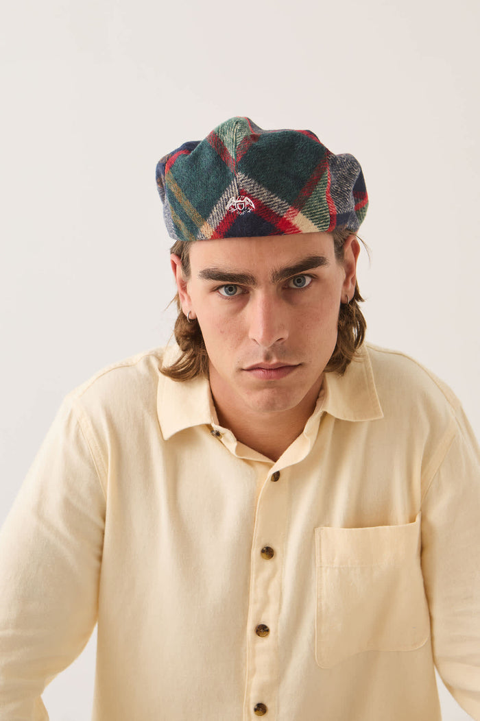 Unisex Century Barrel Snap Cap in the color Navy/Green/Red/Cream - Men's Front View