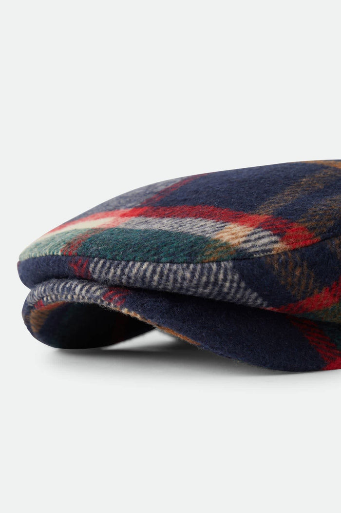 Unisex Century Barrel Snap Cap in the color Navy/Green/Red/Cream - Additional Laydown image