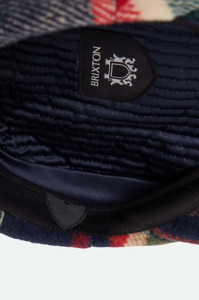 Unisex Century Barrel Snap Cap in the color Navy/Green/Red/Cream - Additional Laydown image