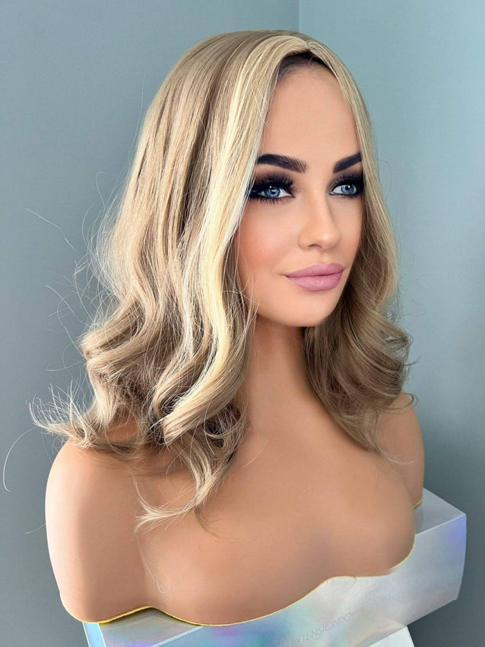 Dana Short Blonde Wig with Highlights displayed on a mannequin showcasing soft waves and a natural look.