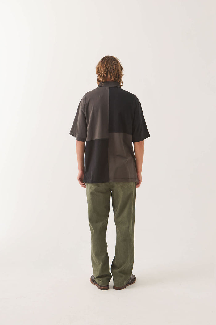 Men's Deco Relaxed Polo T-Shirt in the color Washed Black - Men's Back View