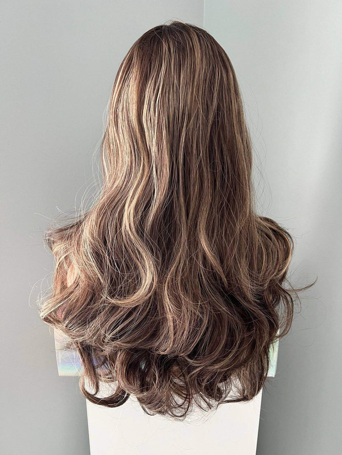 Back view of the Devon Long Brown Curled Wig With Highlights, showcasing soft waves and highlighted layers.