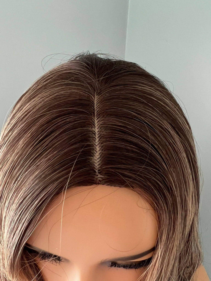 Top view of the Devon Long Brown Curled Wig With Highlights showing layered hair and natural movement.