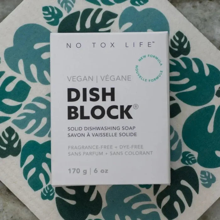 No Tox Life Dish Block packaging on a leaf-patterned surface