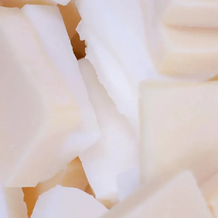 Close-up of white ceramic tiles with a subtle pattern