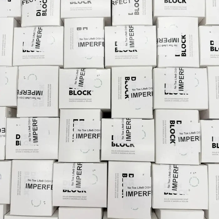 Stack of white boxes with black text on a white background