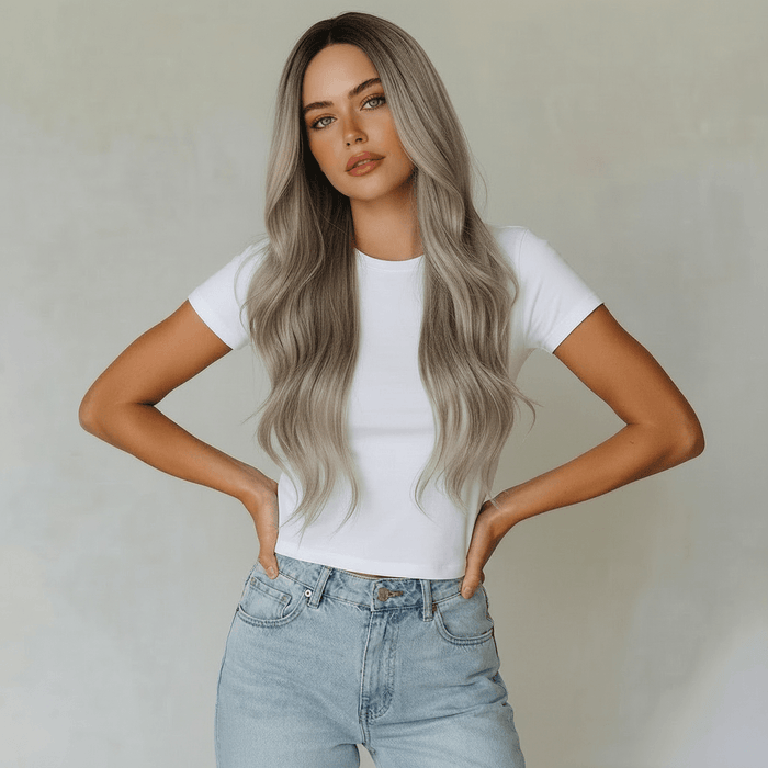 Erika Long Silver Blonde Body Wave Wig displayed on model with flowing waves, showcasing natural volume.