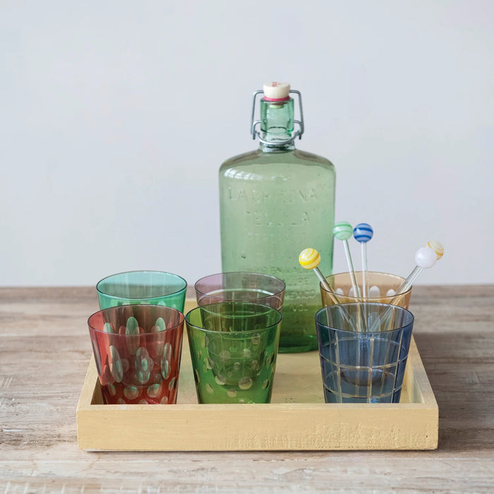 The CREATIVE COOP ETCHED GLASS WITH DESIGN, VARIOUS COLORS features six artisan pastel glasses, each with a unique etched pattern—ideal for those who love distinctive colored glassware.