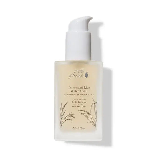 Bottle of Fermented Rice Water Toner - 100 ml for brightening and hydrating skin, enriched with enzymes and amino acids.