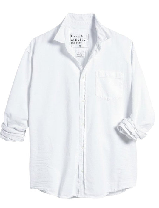 The FRANK & EILEEN LUKE Men's Button Up Shirt in Famous Denim White features long roll-up sleeves, a chest pocket, and a collar. The label reads "Frank & Eileen EST 1947." Displayed on a white background.
