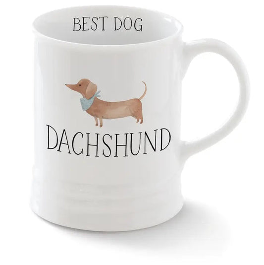 The PET SHOP BY FRINGE STUDIO "Ceramic Dachshund Mug" features a white ceramic design with a dachshund in a blue scarf, "BEST DOG" above and "DACHSHUND" below—ideal for pet lovers.