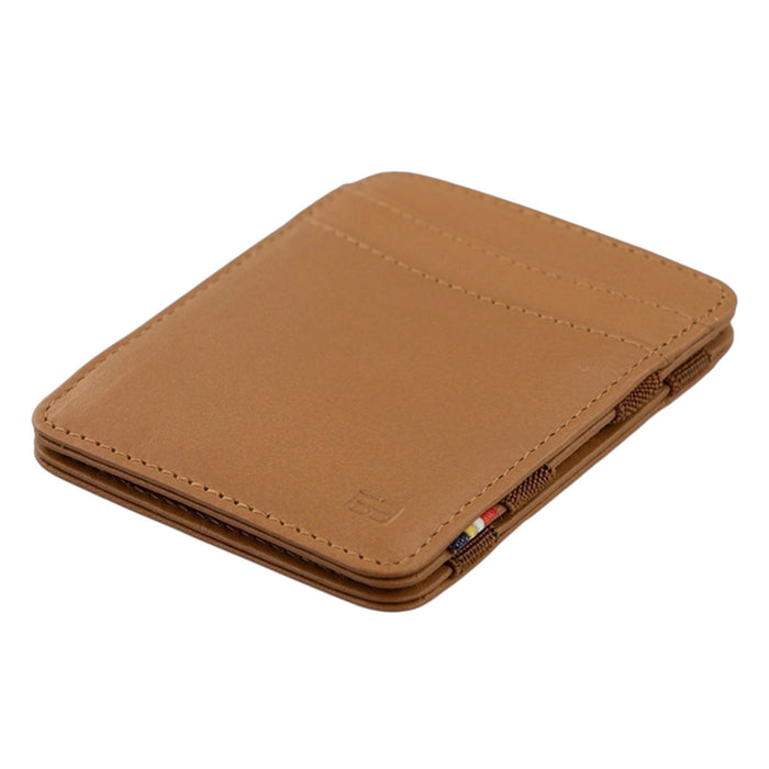 The GARZINI Magic Slim RFID-blocking leather wallet in cognac features visible stitching, card slots, and a small colorful fabric detail on the side, shown on a white background.